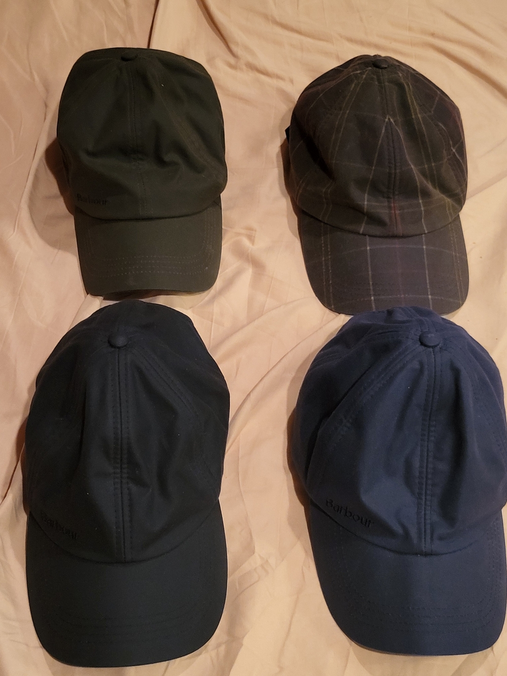 Barbour Four-Pack Men's Waxed Caps in Olive, Plaid, Black, and Navy